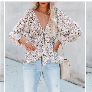 Floral peplum front-tie top
